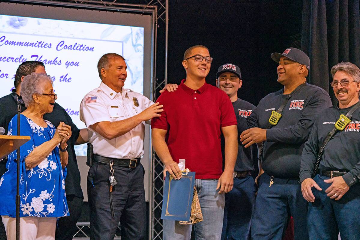 John Clausen/Pahrump Valley Times Abel Ortega is shown receiving the Community Hero Award at th ...