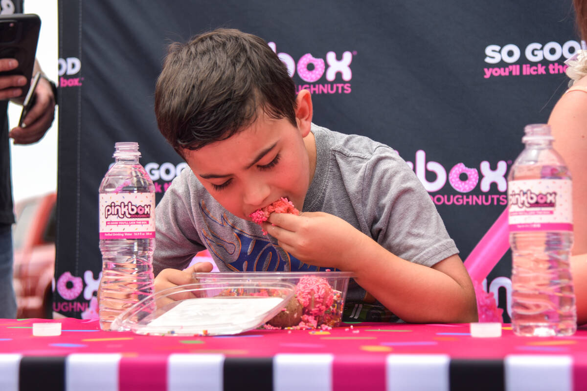 Zuko Garcia eats donuts for the kids doughnut eating contest before winning a year supply of do ...