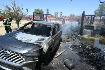 Special to the Pahrump Valley A fire consumed two structures and vehicles on Sunday, May 19, j ...