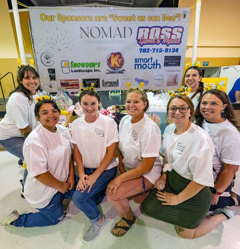 John Clausen/Pahrump Valley Times Members of Pahrump Mothers Corner pose for a photo with the C ...
