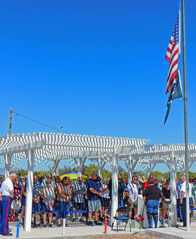 Robin Hebrock/Pahrump Valley Times A sizable crowd is pictured with heads bowed as a prayer is ...