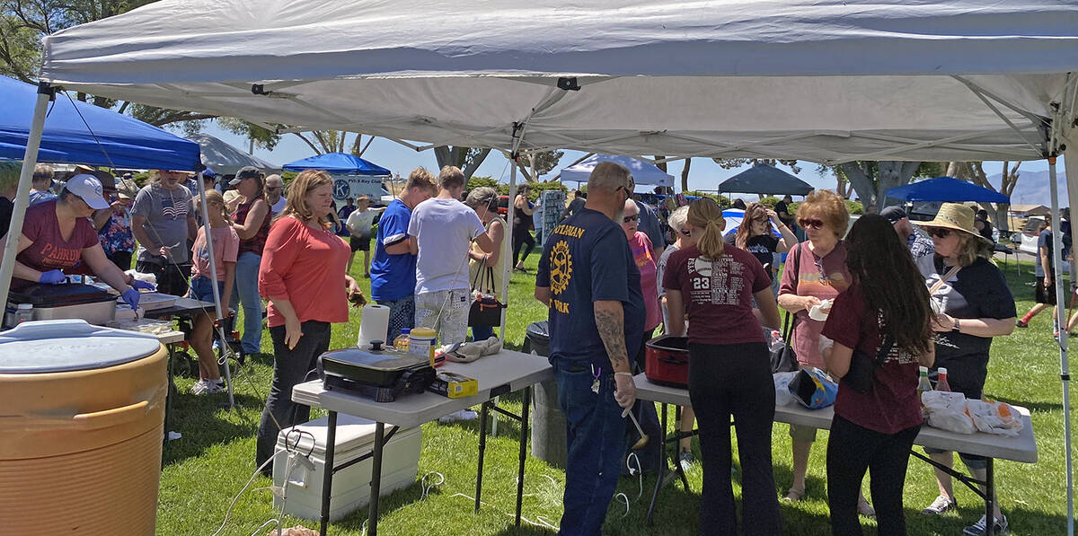 Robin Hebrock/Pahrump Valley Times The Pahrump Rotary Club, pictured serving up tastings, took ...