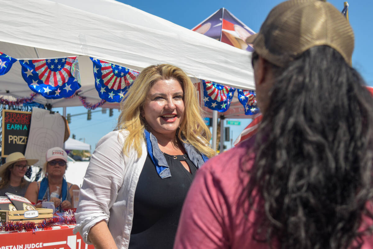 Michele Fiore (left) speaks to Launa Schatz (right), a Pahrump resident and voter in the 2024 N ...
