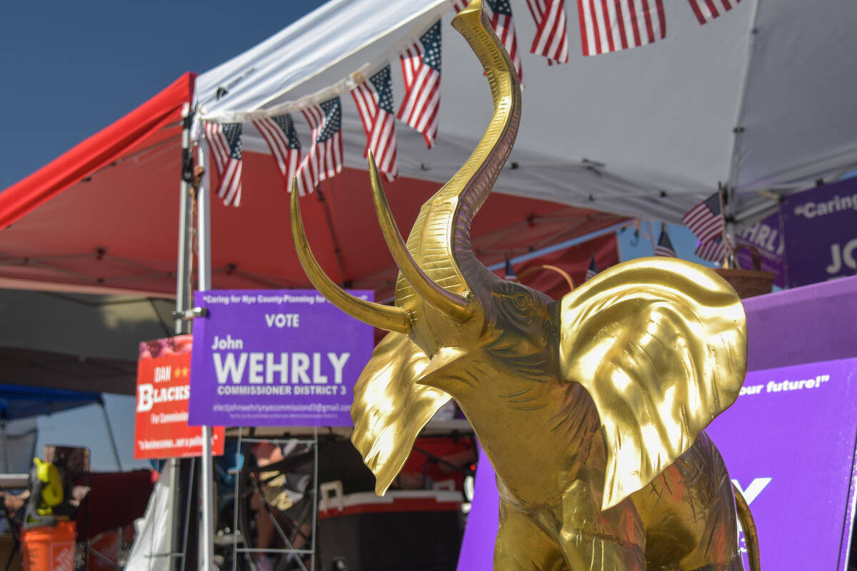 A gold elephant in front of tents in the parking lot of the Bob Ruud Community Center on Nevada ...