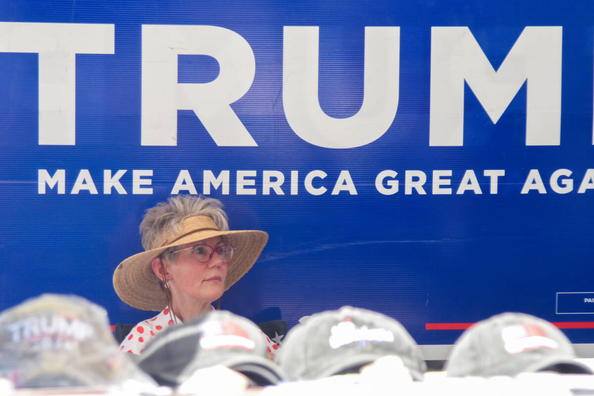 Tamie Pitman in the parking lot of the Bob Ruud Community Center in a Trump tent on Nevada prim ...