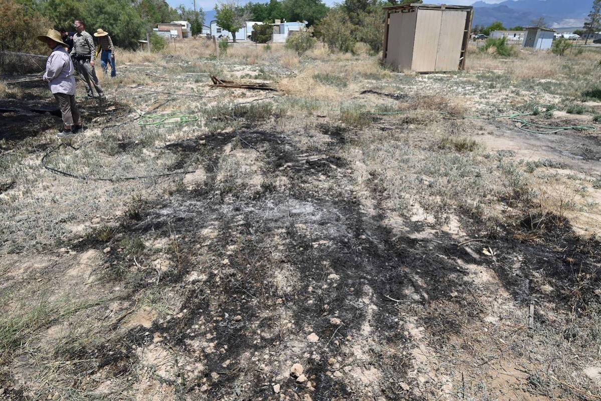 Special to the Pahrump Valley Times A brush fire on S. Michael Drive in Pahrump is suspected to ...