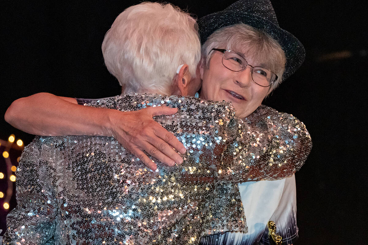 John Clausen/Pahrump Valley Times Ms. BJ Hetrick-Irwin, founding principal of Golden Years, hugs the judge...