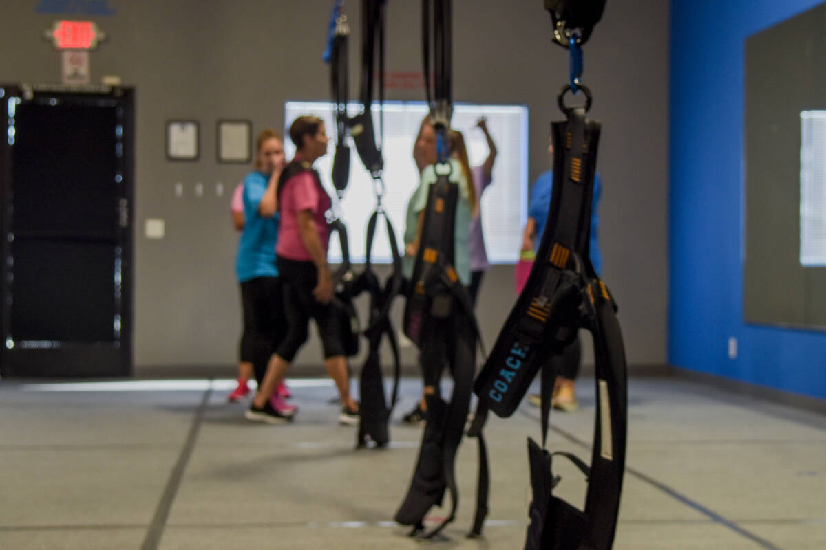 A bungee harness hangs from a 14 foot ceiling after Fitlife Bungee finished up their live demon ...