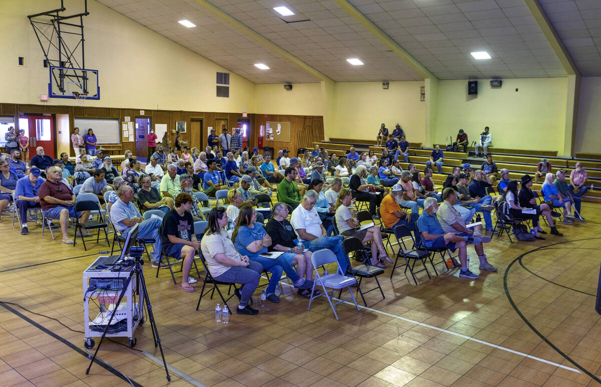 The community building is full as Rover Critical Minerals hosts a town hall for residents conce ...