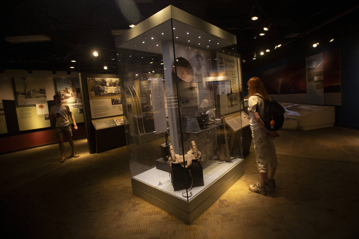 Tourists visit the museum inside the Furnace Creek Visitor Center on Monday, July 8, 2024, in D ...