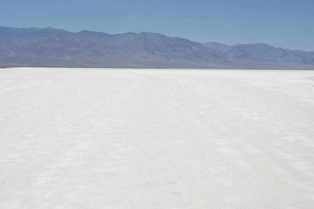 Salt coats the ground at Badwater Basin on Monday, July 8, 2024, in Death Valley National Park, ...