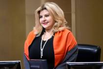 Former Las Vegas City Councilwoman Michele Fiore stands for invocation during a council meeting ...