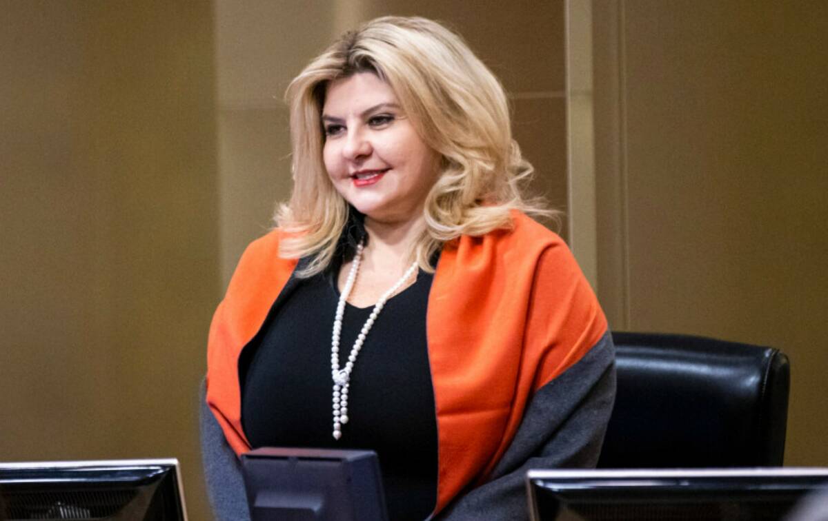 Former Las Vegas City Councilwoman Michele Fiore stands for invocation during a council meeting ...