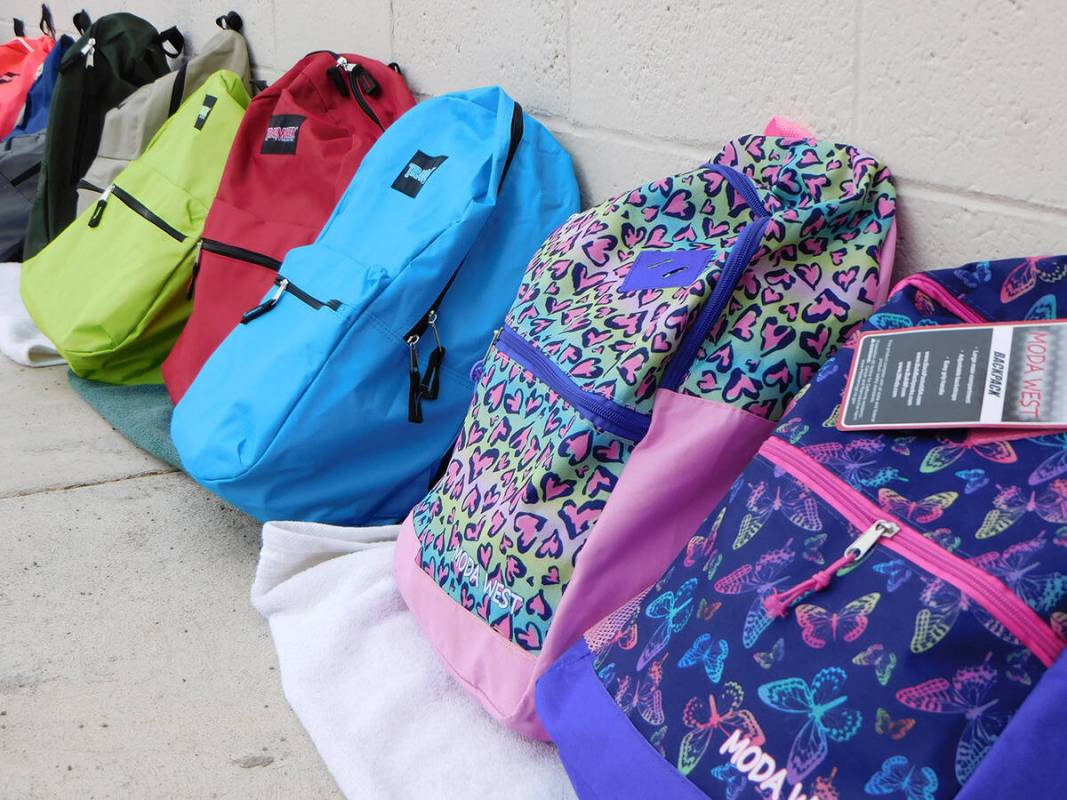 Robin Hebrock/Pahrump Valley Times Hundreds of backpacks of all colors and designs are handed o ...