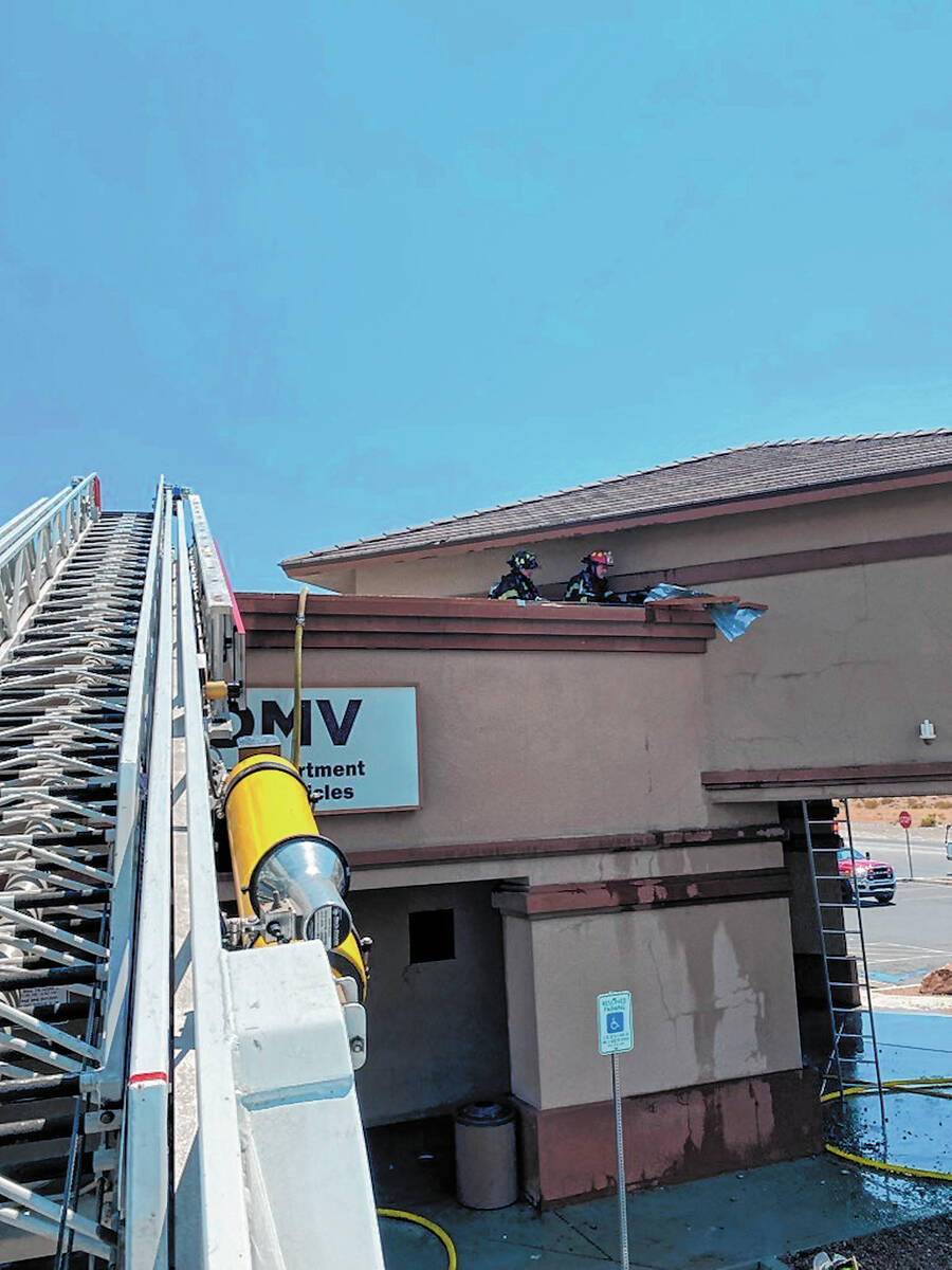 Special to the Pahrump Valley Times Crews utilized a ladder truck along with ground ladders to ...