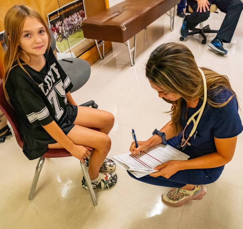 John Clausen/Pahrump Valley Times Potential school athletes were offered free sports physicals ...