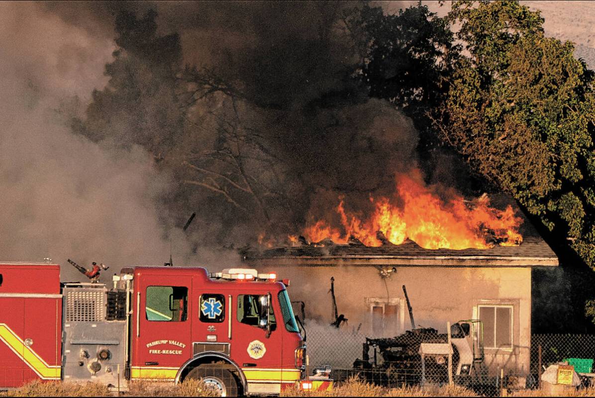 John Clausen/Pahrump Valley Times A home at Adams Road and Rockaway Lane was completely destroy ...