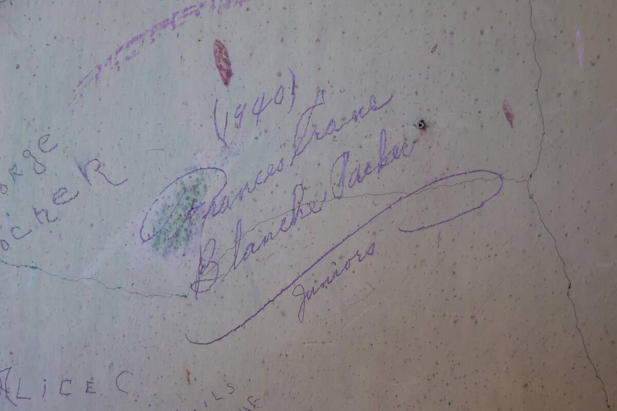 Graffiti from a student who attended Goldfield High School is seen on a wall during Goldfield D ...