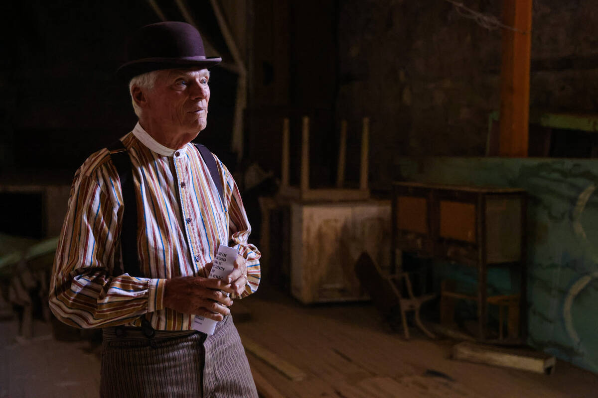 Goldfield Historical Society president John Ekman stands inside of the Lyric Theatre during Gol ...