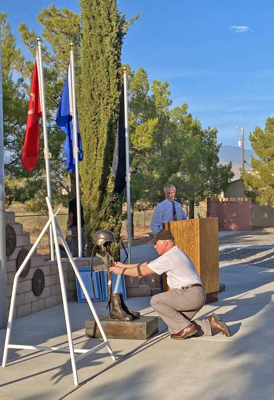 Robin Hebrock/Pahrump Valley Times Maj. Tim Callahan is shown placing the ID tags upon the Batt ...