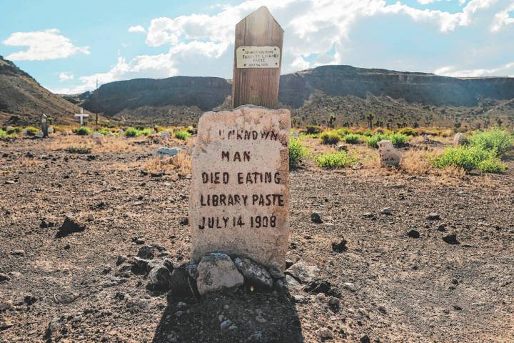 A grave for ankown man who died after eating library paste is seen in the Goldfield Graveyard o ...