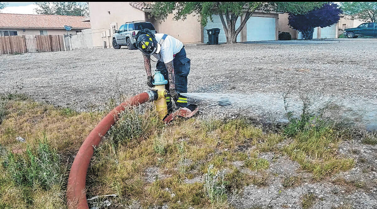 Special to the Pahrump Valley Times Crews were forced to leave the blaze at Ricksue Street mult ...