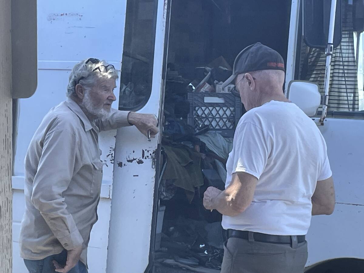 Faye Burdzinski/Pahrump Valley Times W.T. “Smitty” Smith (left) chats with a customer at hi ...