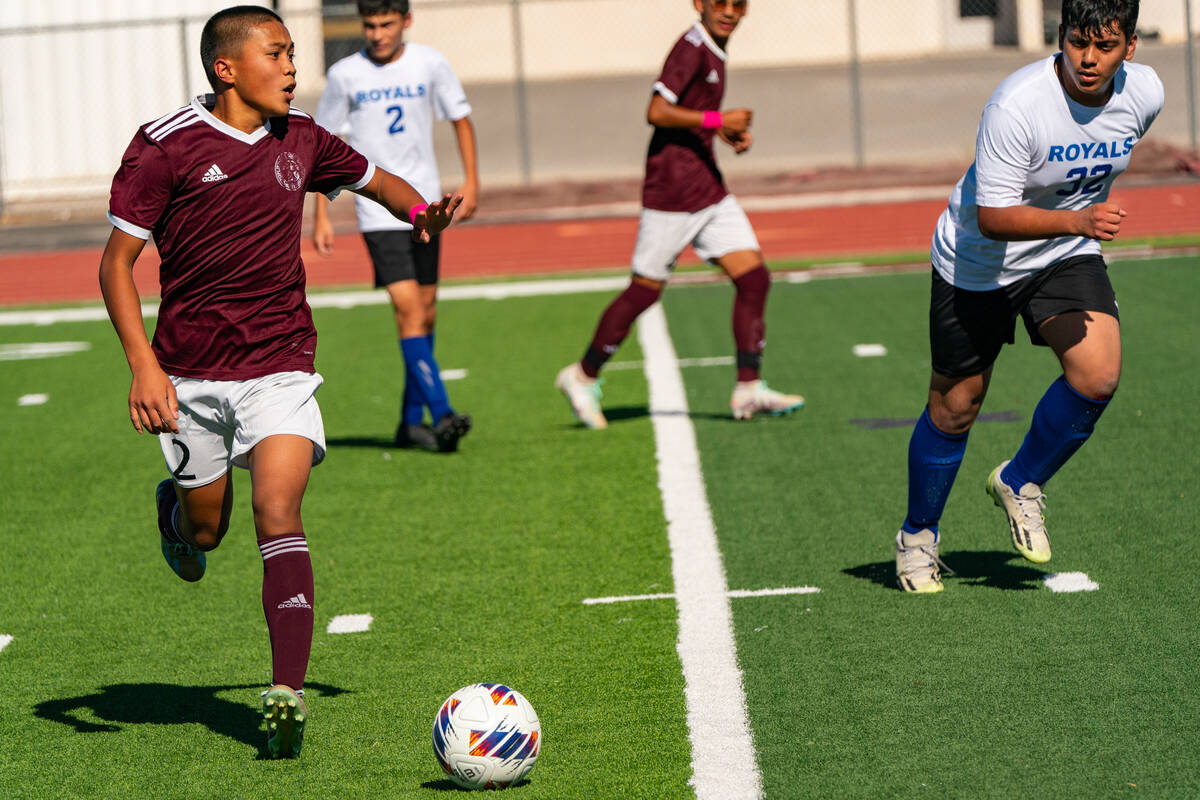 Trojan’s Calab Sierra-Hudgens (2) has possession of the ball in a game against Cristo Re ...