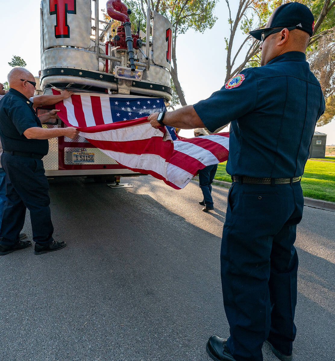 John Clausen/Pahrump Valley Times An American Flag was displayed from Tower Ladder One, which r ...