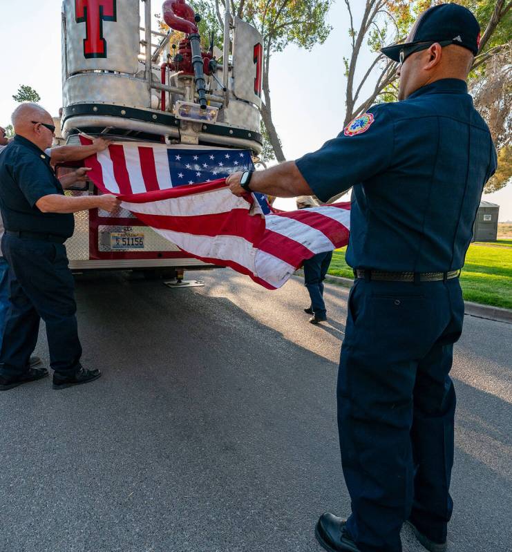 John Clausen/Pahrump Valley Times An American Flag was displayed from Tower Ladder One, which r ...