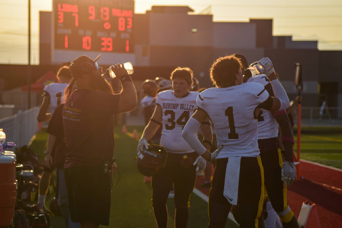 Pahrump Valley’s team watched from the sidelines as a Somerset Academy Losee player is i ...