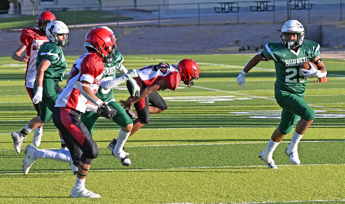 Beatty's Anthoni Aguilar (29) caught a pass and runs on the side of the field away from the Dia ...