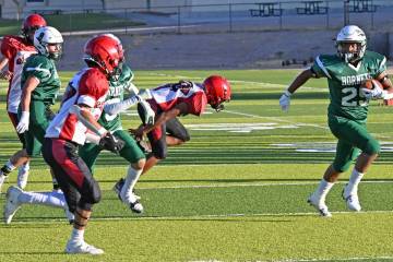 Beatty's Anthoni Aguilar (29) caught a pass and runs on the side of the field away from the Dia ...