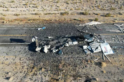 The Nevada Highway Patrol investigates a crash involving two semitractor-trailers Tuesday, Sept ...