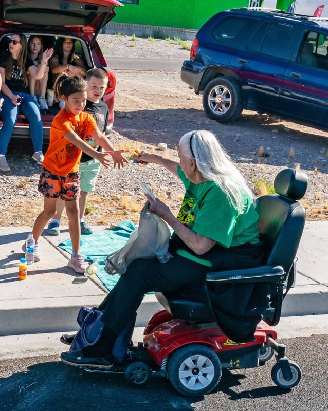 John Clausen/Pahrump Valley Times Kids lined Hwy. 160 for the Fall Festival Parade, where they ...