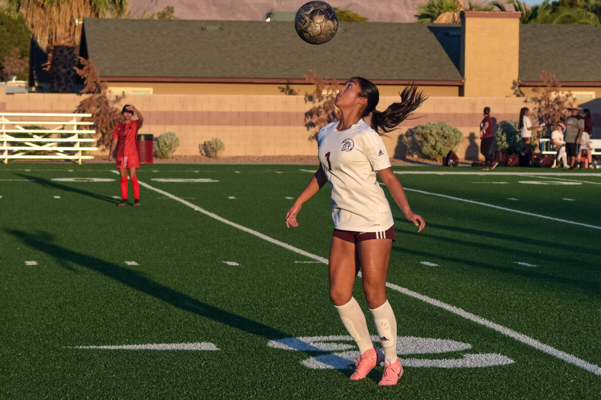 Pahrump Valley’s Natalie Soto (1) receives the ball with her head before Mater Academy E ...