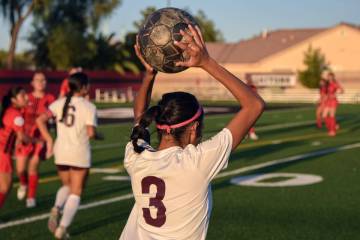 Pahrump Valley’s Valery Romero (3) passes the ball to a teammate after the Mater Academy ...