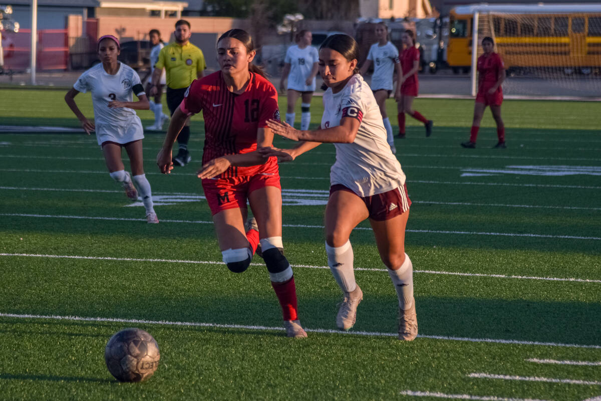 Pahrump Valley’s Natalia Vallin (6) (right) goes head-to-head with Mater Academy East La ...