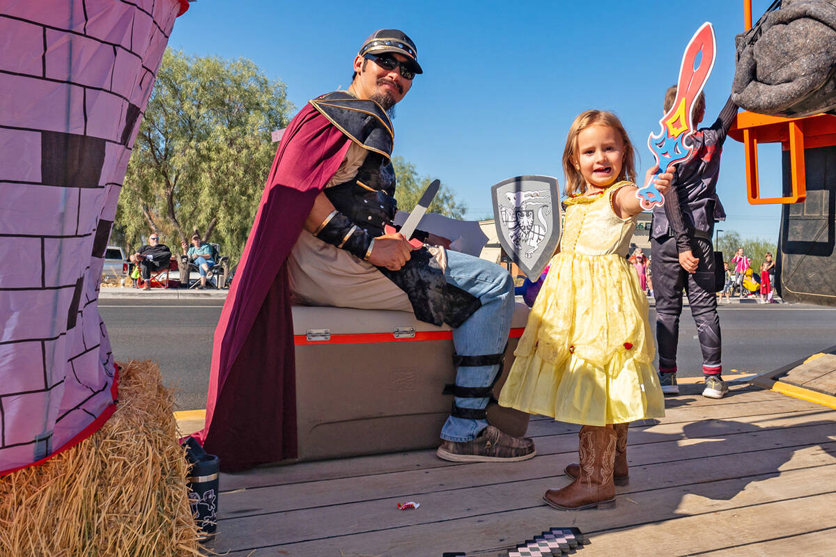 John Clausen/Pahrump Valley Times A young princess waves to the crowd with sword held aloft at ...