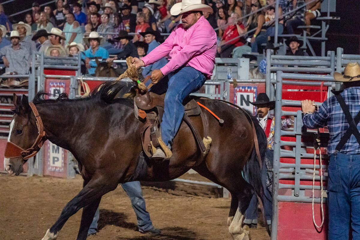 A man rides a horse during the Pahrump Falls Festival 2024 rodeo on Saturday, Sep. 21, 2024, in ...