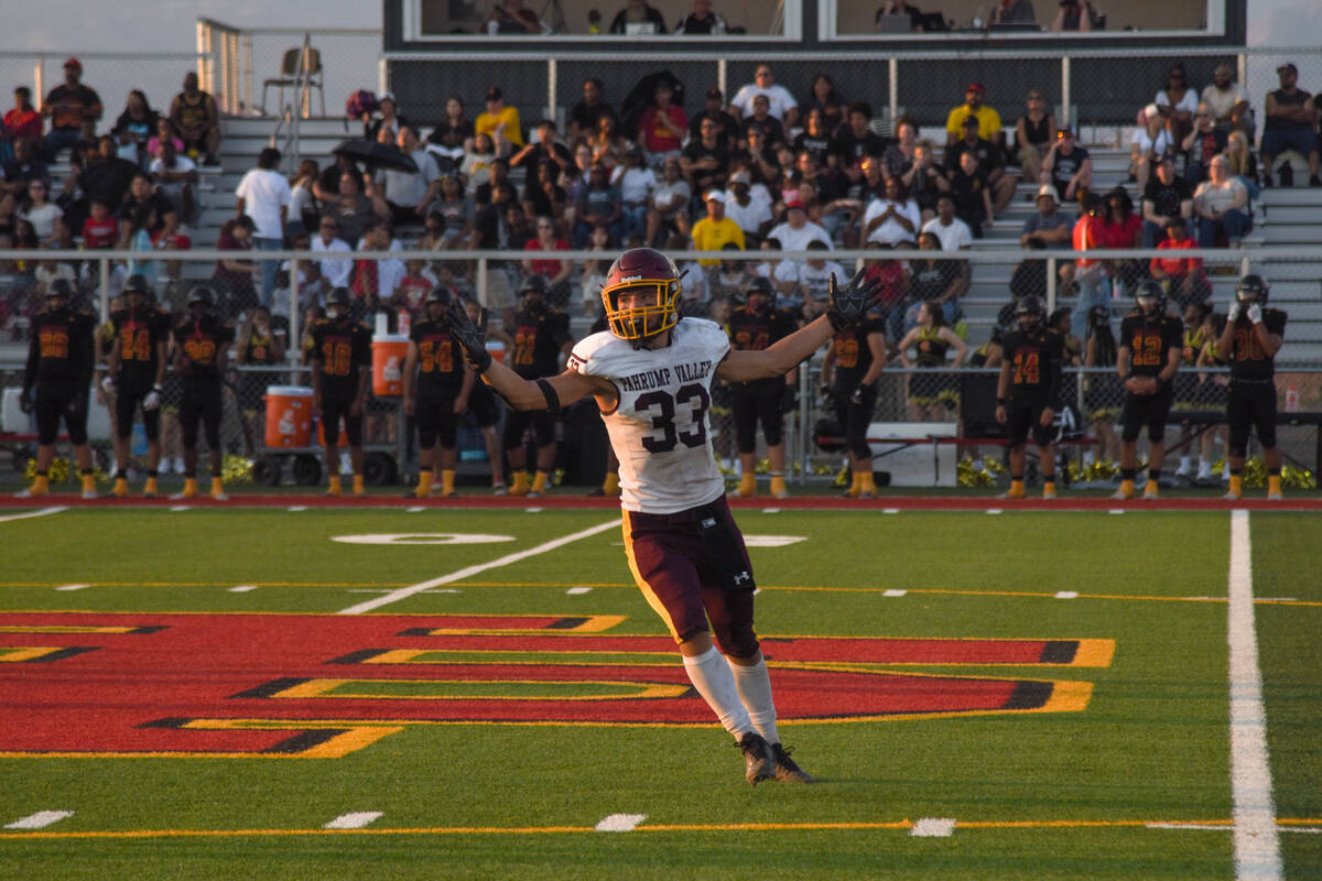 Trojan’s Austin Alveraz (33) flares his arms up after a play in frustration after he was ...