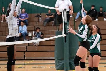 Beatty Hornet Julianne Lindsey spikes the ball toward the Indian Springs side of the court on M ...