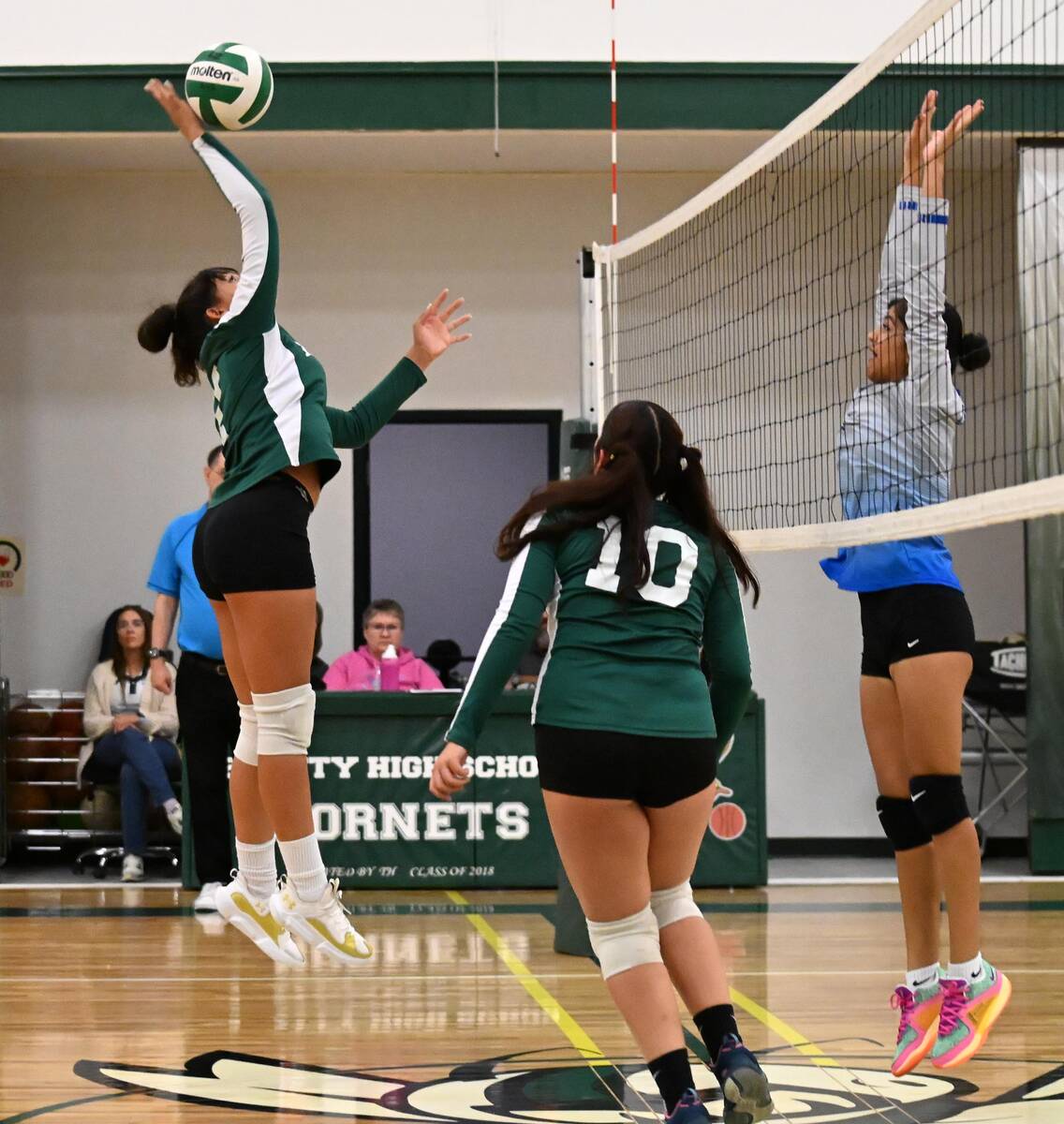 Beatty's Lavandar Hart spikes the ball towards the Laughlin Cougars on Thursday, Sept. 26, 2024 ...