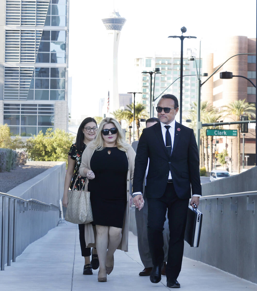 Former Las Vegas City Councilwoman Michele Fiore, left, arrives for her wire fraud trial at the ...