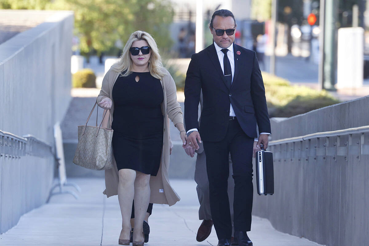 Former Las Vegas City Councilwoman Michele Fiore, left, arrives for her wire fraud trial at the ...