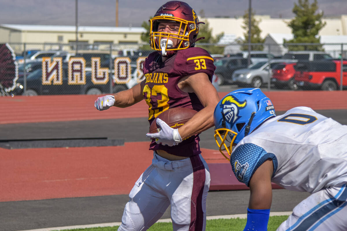 Trojans Austin Alvarez (33) caught a touchdown pass to score the first Pahrump Valley touchdown ...