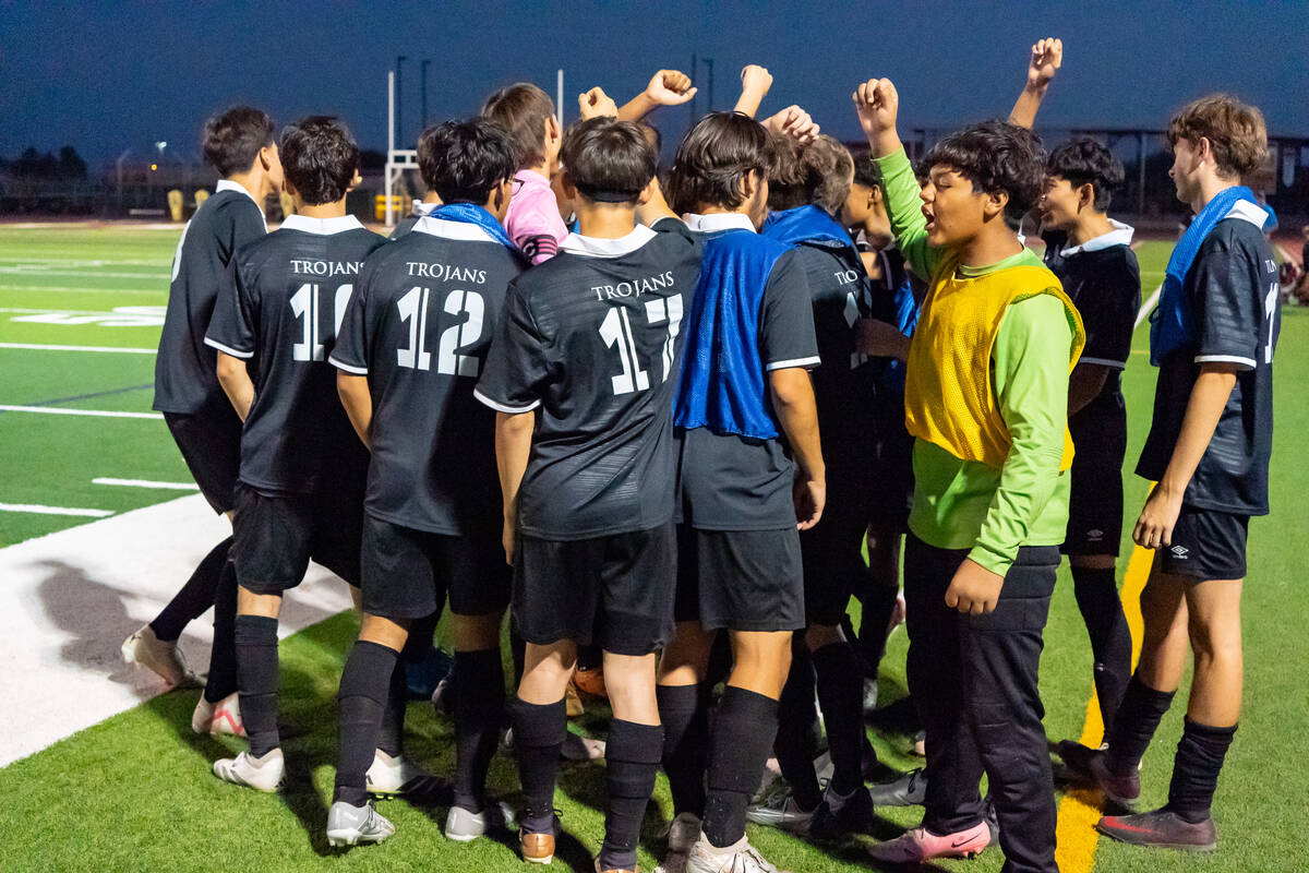 Pahrump boys soccer team huddles before their game against Doral Academy on Thursday, Sept. 12, ...