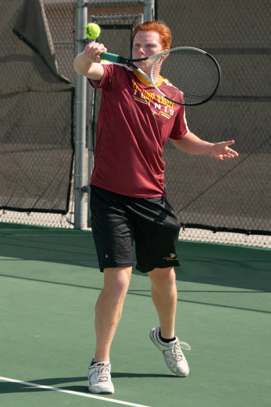 Pahrump Valley's Sonny Skinner hits the ball in the quarterfinals game against Sloan Canyon in ...