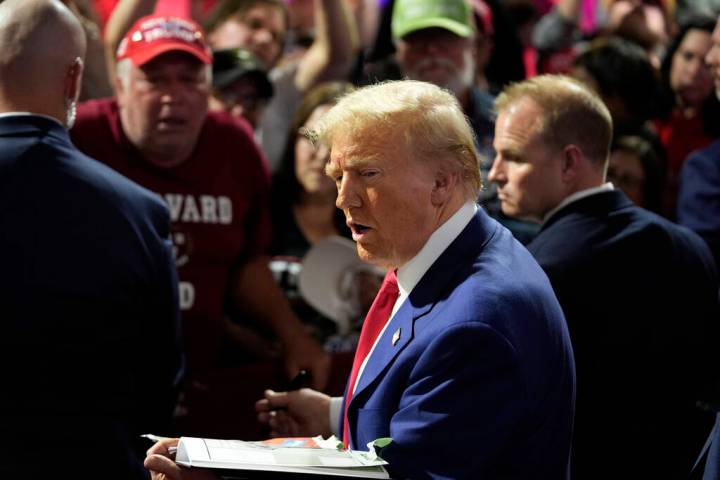 Republican presidential nominee former President Donald Trump greets supporters at a campaign t ...