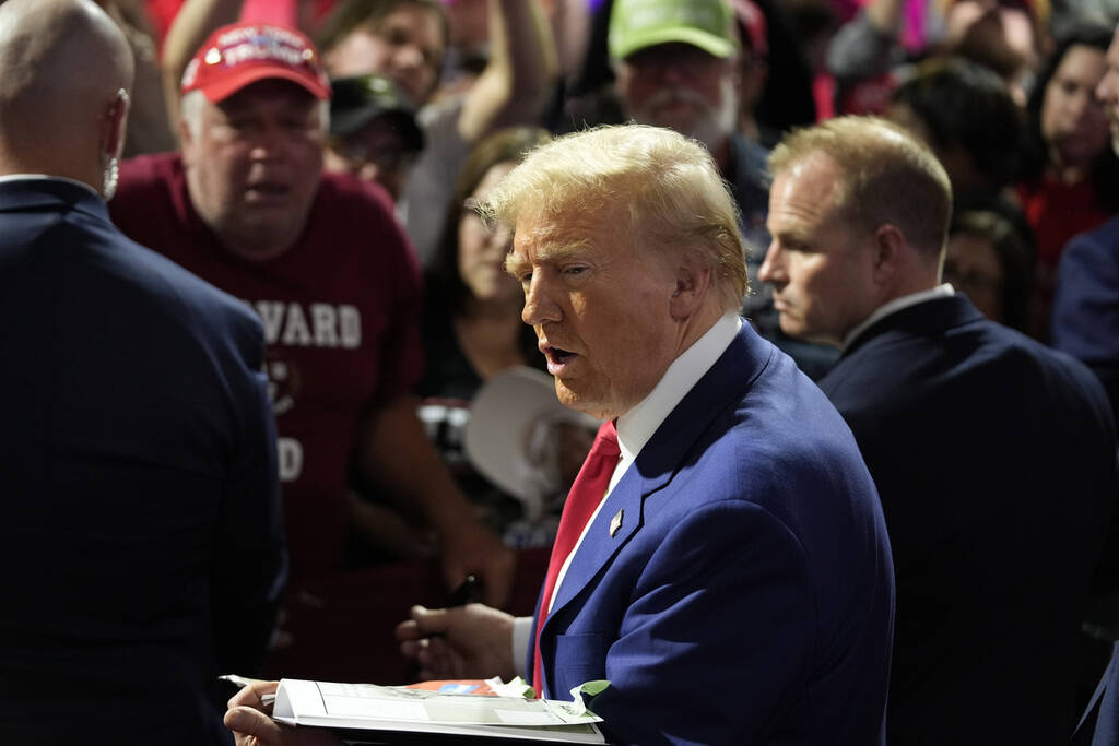 Republican presidential nominee former President Donald Trump greets supporters at a campaign t ...